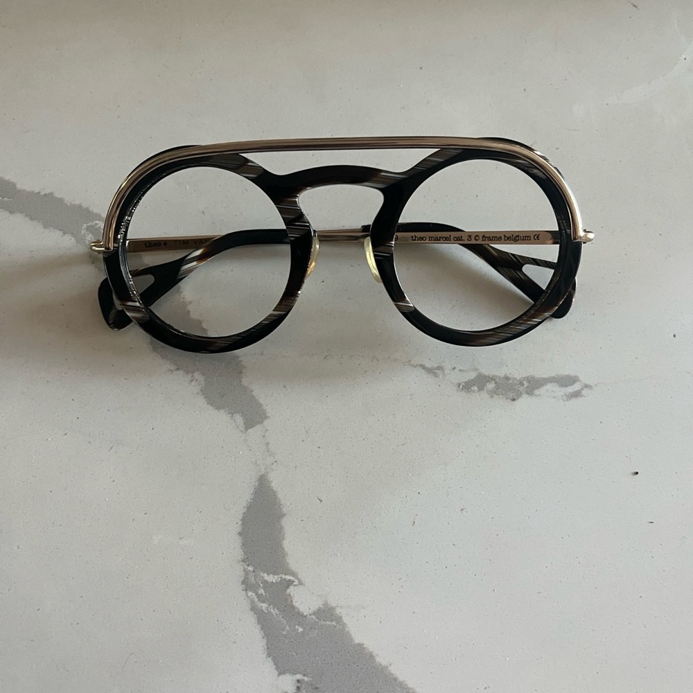 Theo Sunglasses - took my prescription lenses out  46 eye size. Great condition